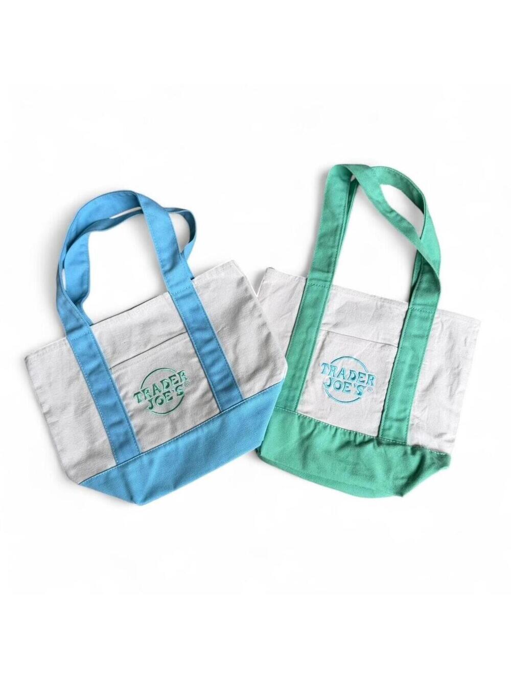 Trader Joe's blue & white canvas tote bag and green and white canvas tote bag